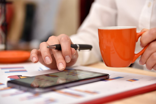 Trader Woman Analyzing Report